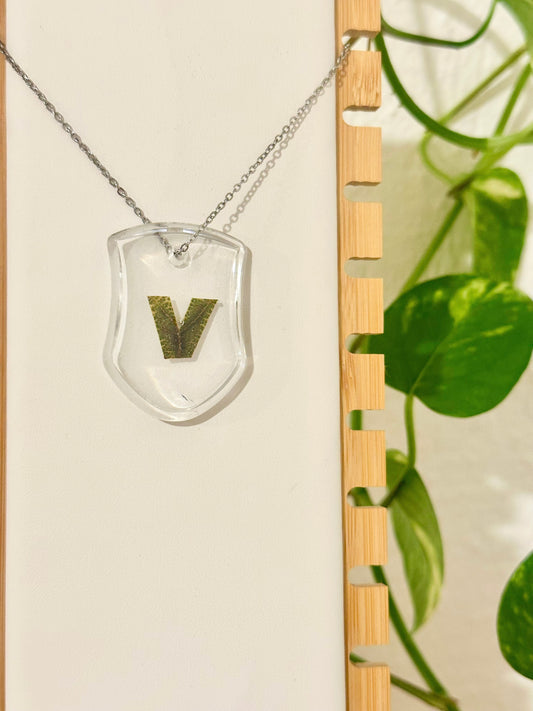 V letra verde